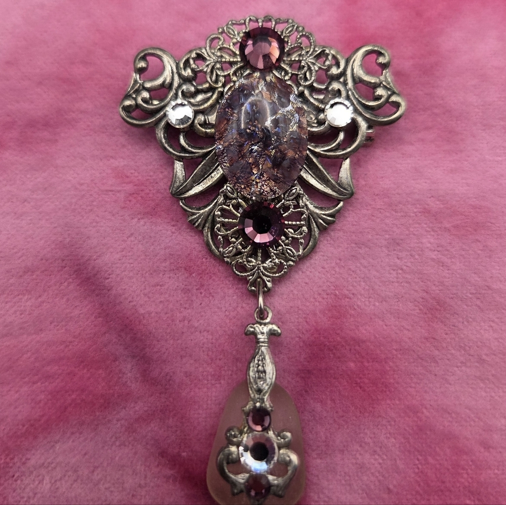 665.  Silvertone and Pink Brooch Or Pendant